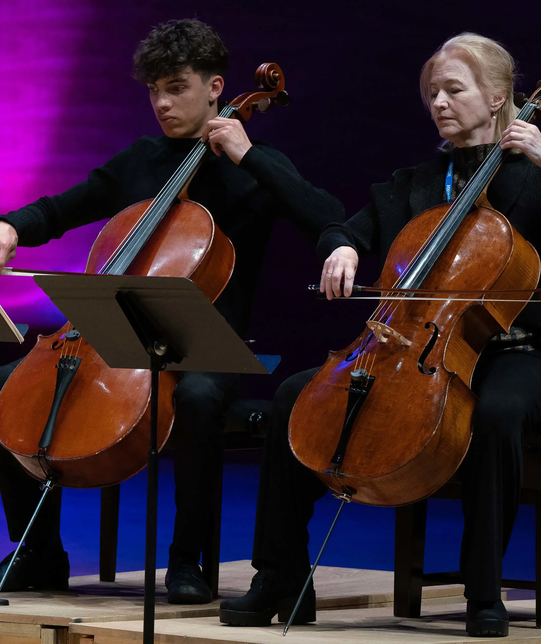 St. Mary's Music School pupil and teacher playing cellos