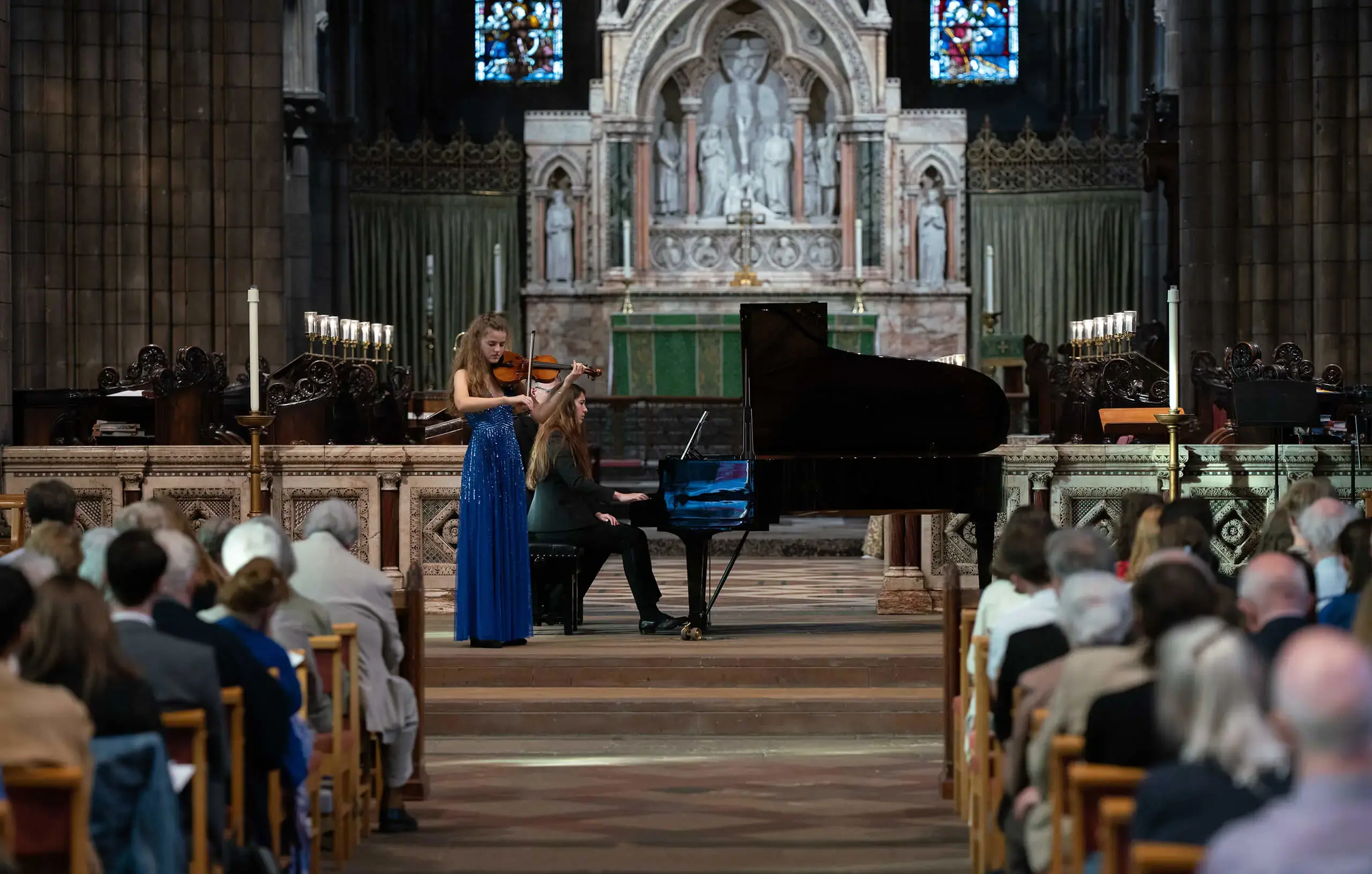 St. Mary's Music School violin pupil performing in St. Mary's Episcopal Cathedral