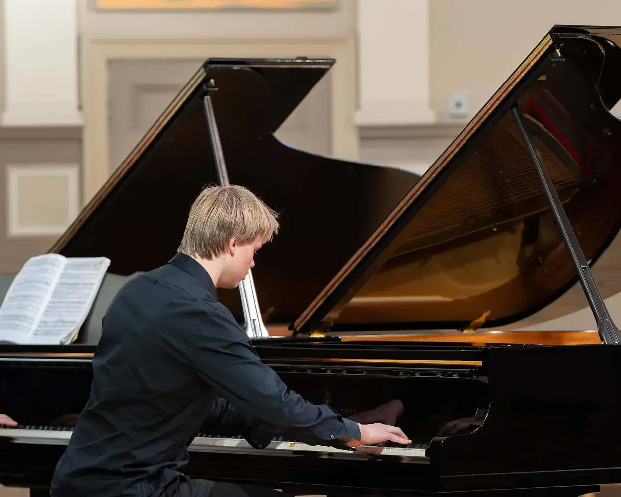 Pupil playing piano at St Mary's Music School, Edinburgh