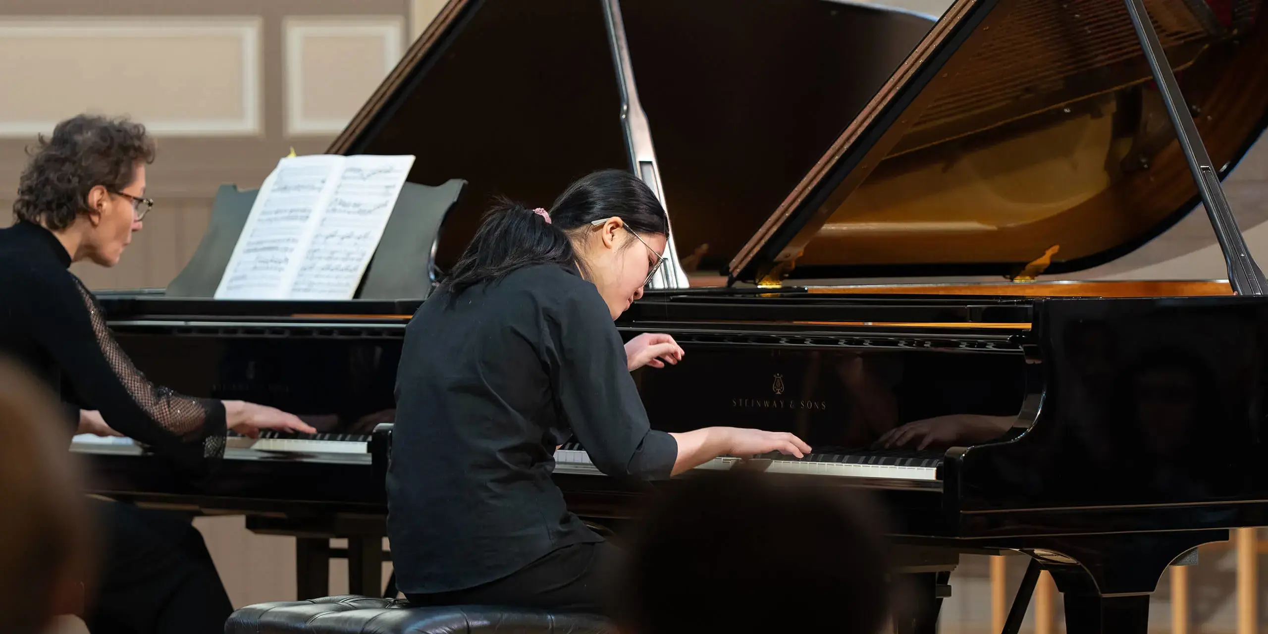 St Mary's Music School pupil playing the piano