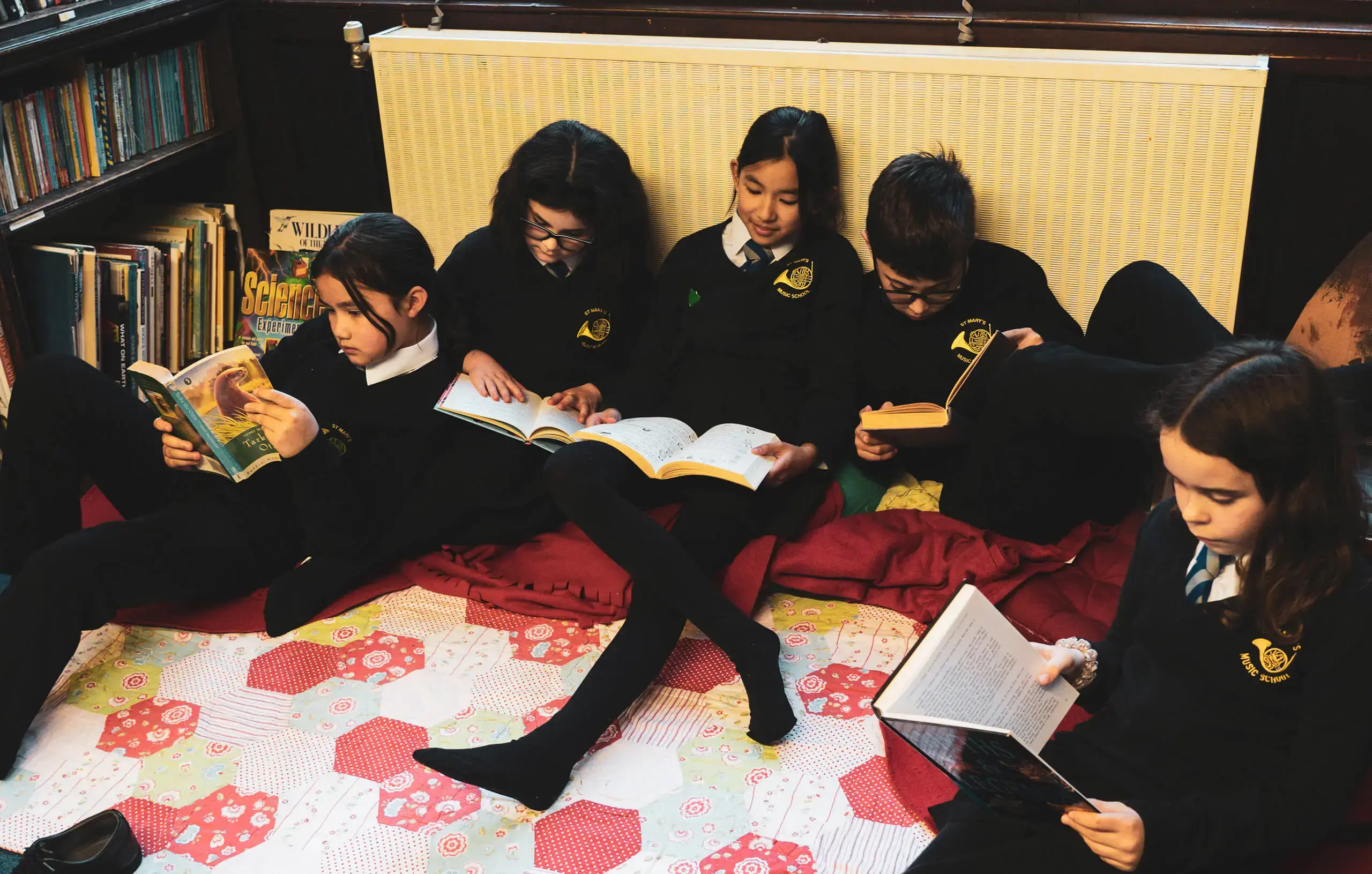 St Mary's Music School pupils reading together