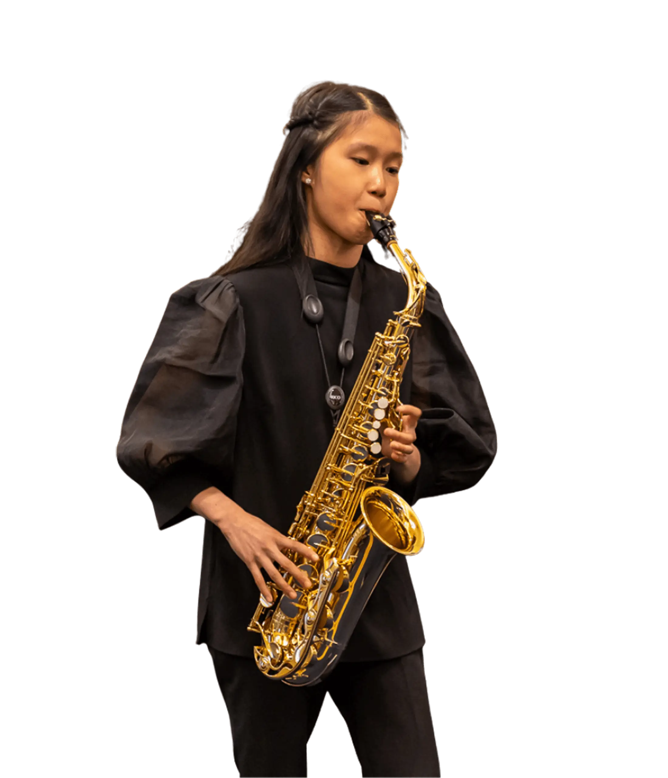 St. Mary's Music School pupil playing the saxophone