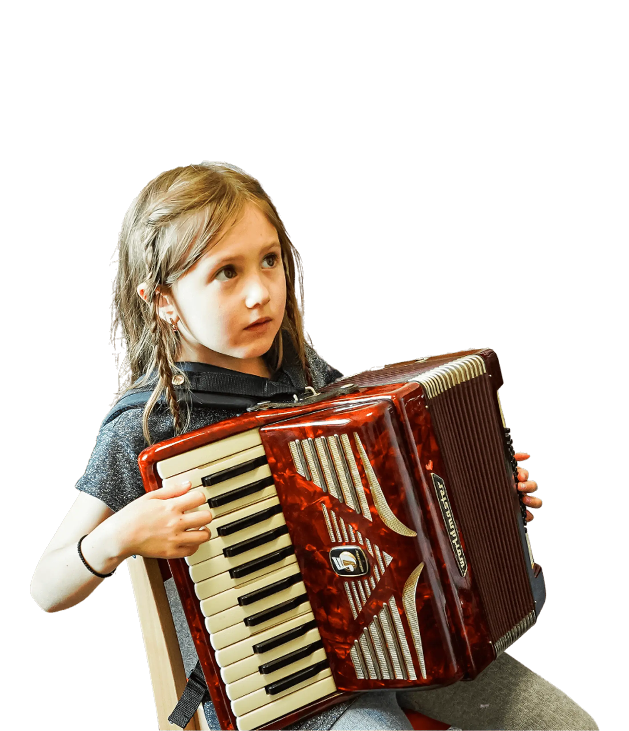 Saturday Music School pupil learning the accordion