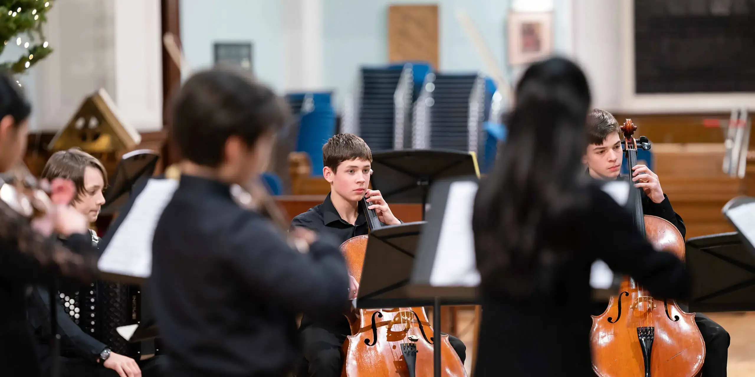 Pupils performing on stage at St Mary's Music School