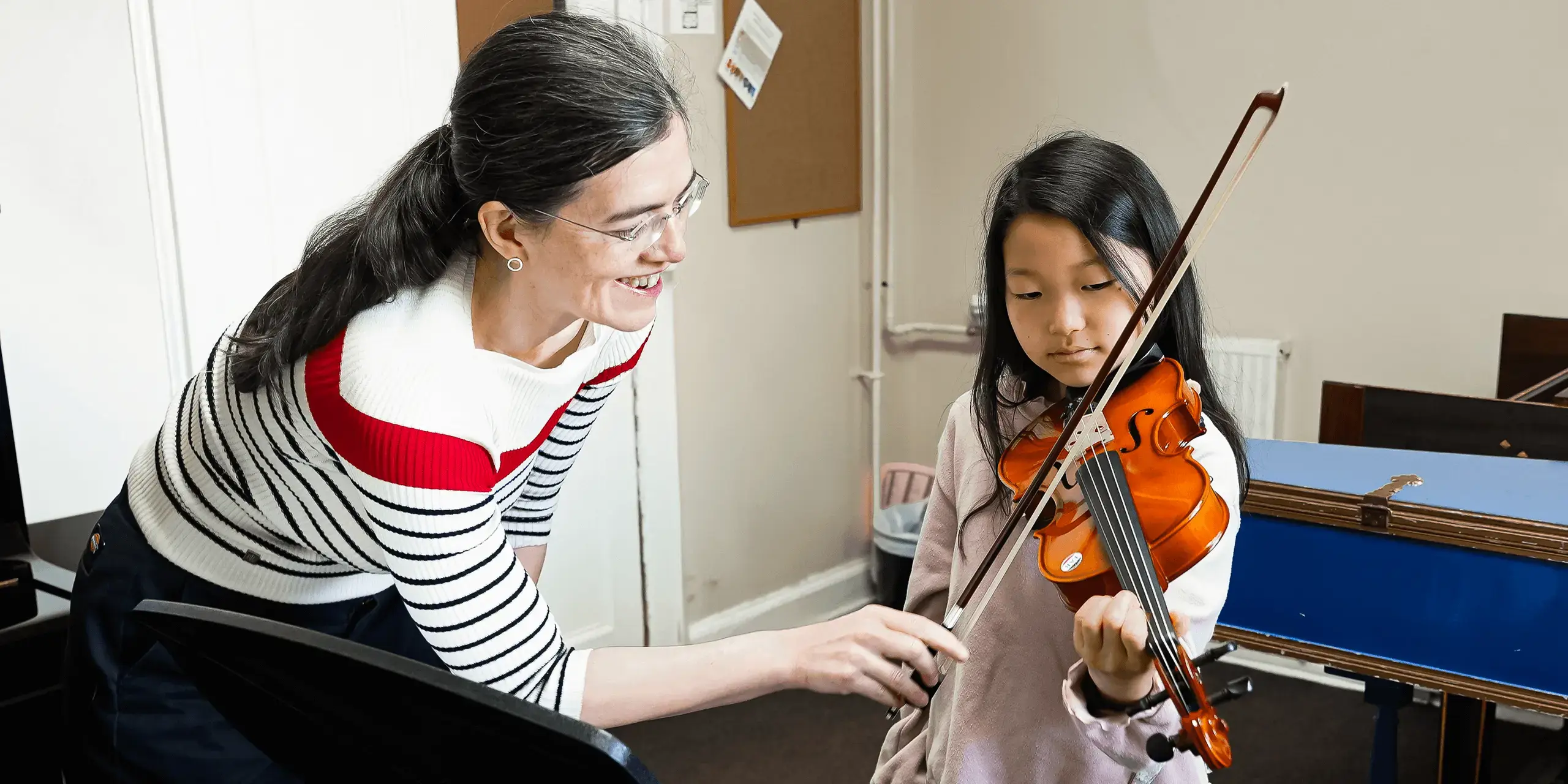 St Mary's Music School pupil in a violin lesson