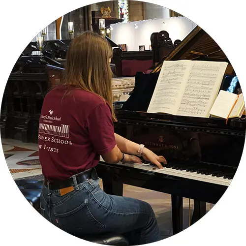 St. Mary's Music School Summer Piano School pupil practicing